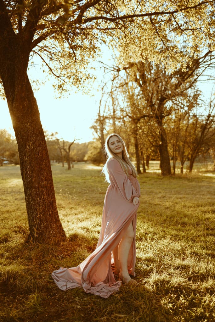 Golden hour maternity session in a field in Buffalo Gap, TX