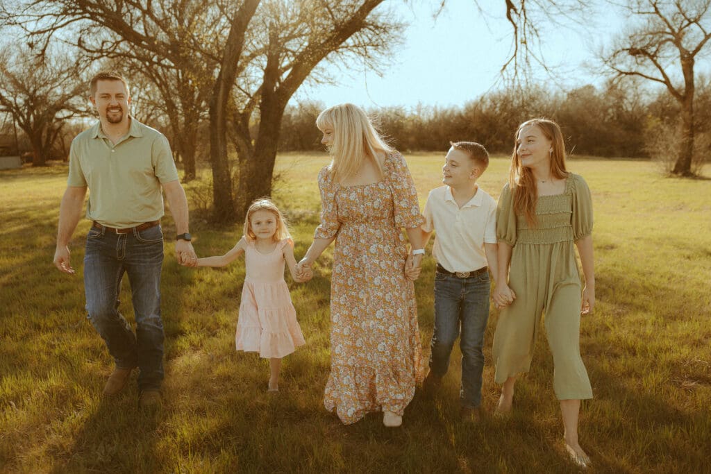 Intimate family session in a golden field in Abilene, TX