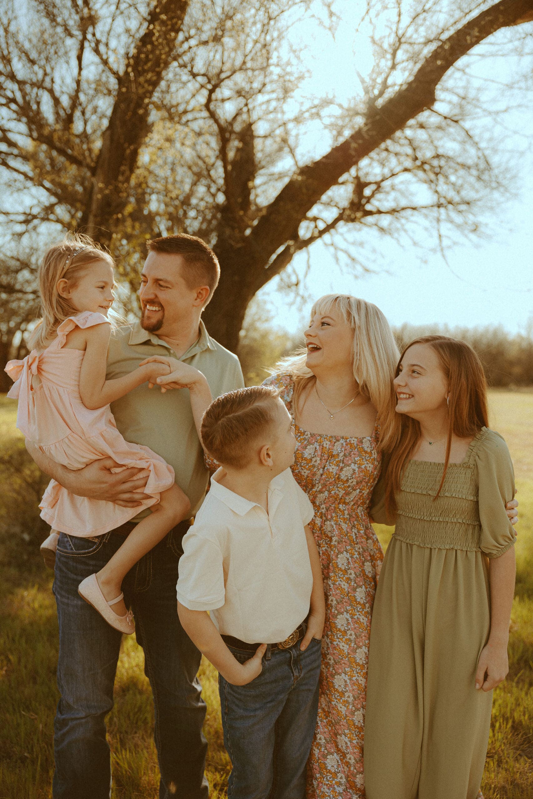 Intimate family session in a golden field in Abilene, TX