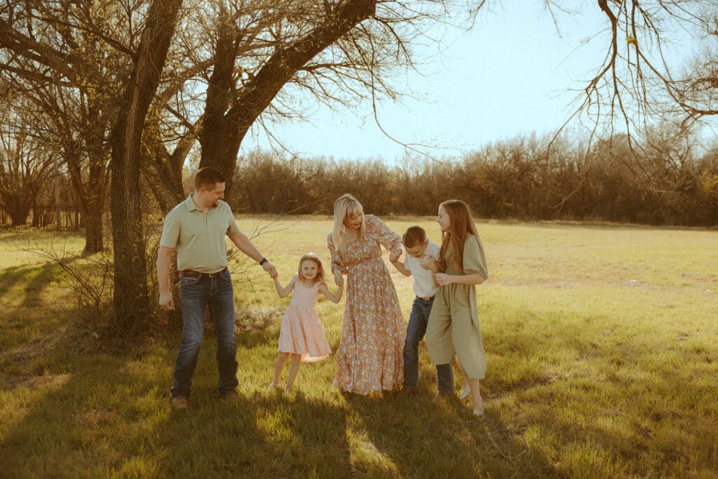 Intimate family session in a golden field in Abilene, TX