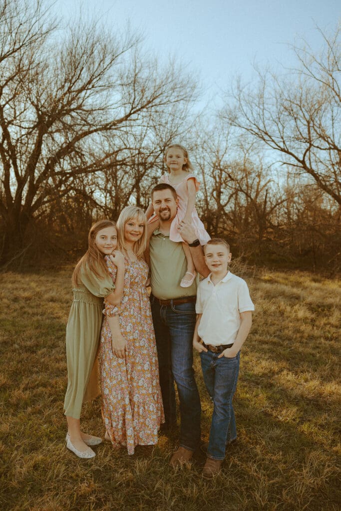 Intimate family session in a golden field in Abilene, TX