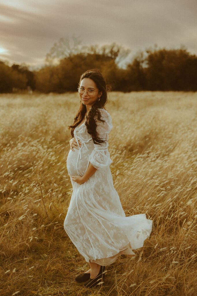 Dreamy maternity session in a golden field in Buffalo Gap, TX