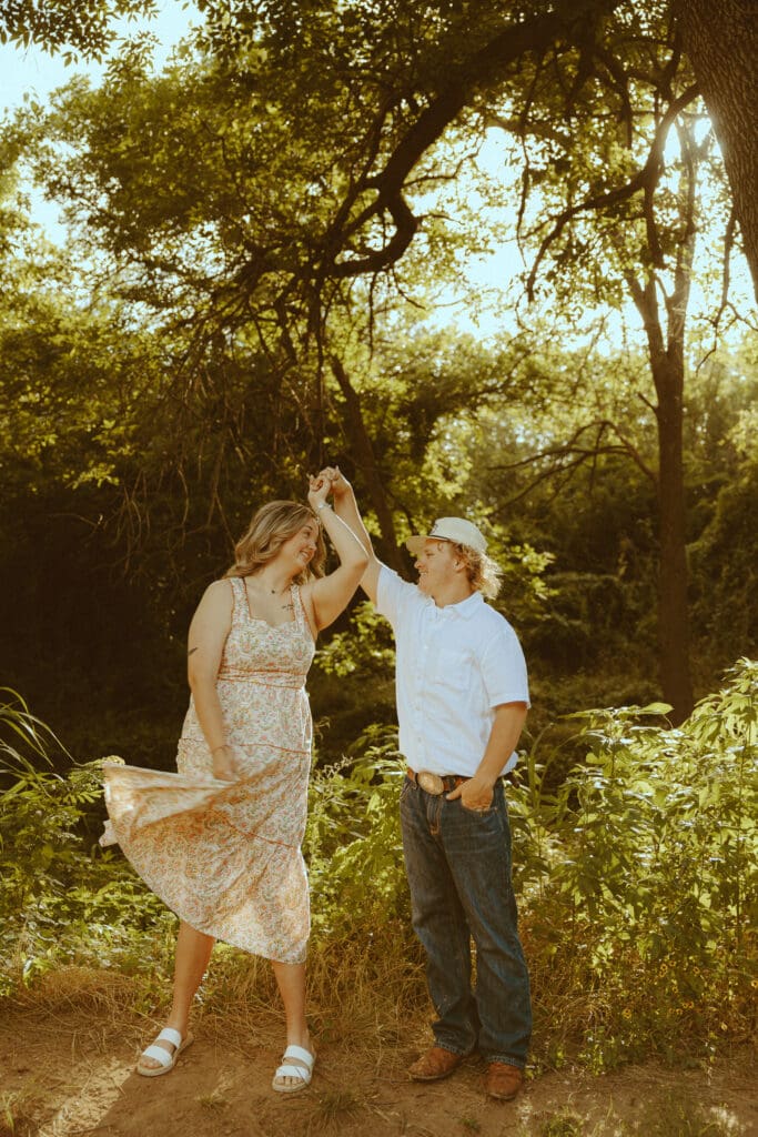 Golden couples session in a field by a creek in Abilene, TX