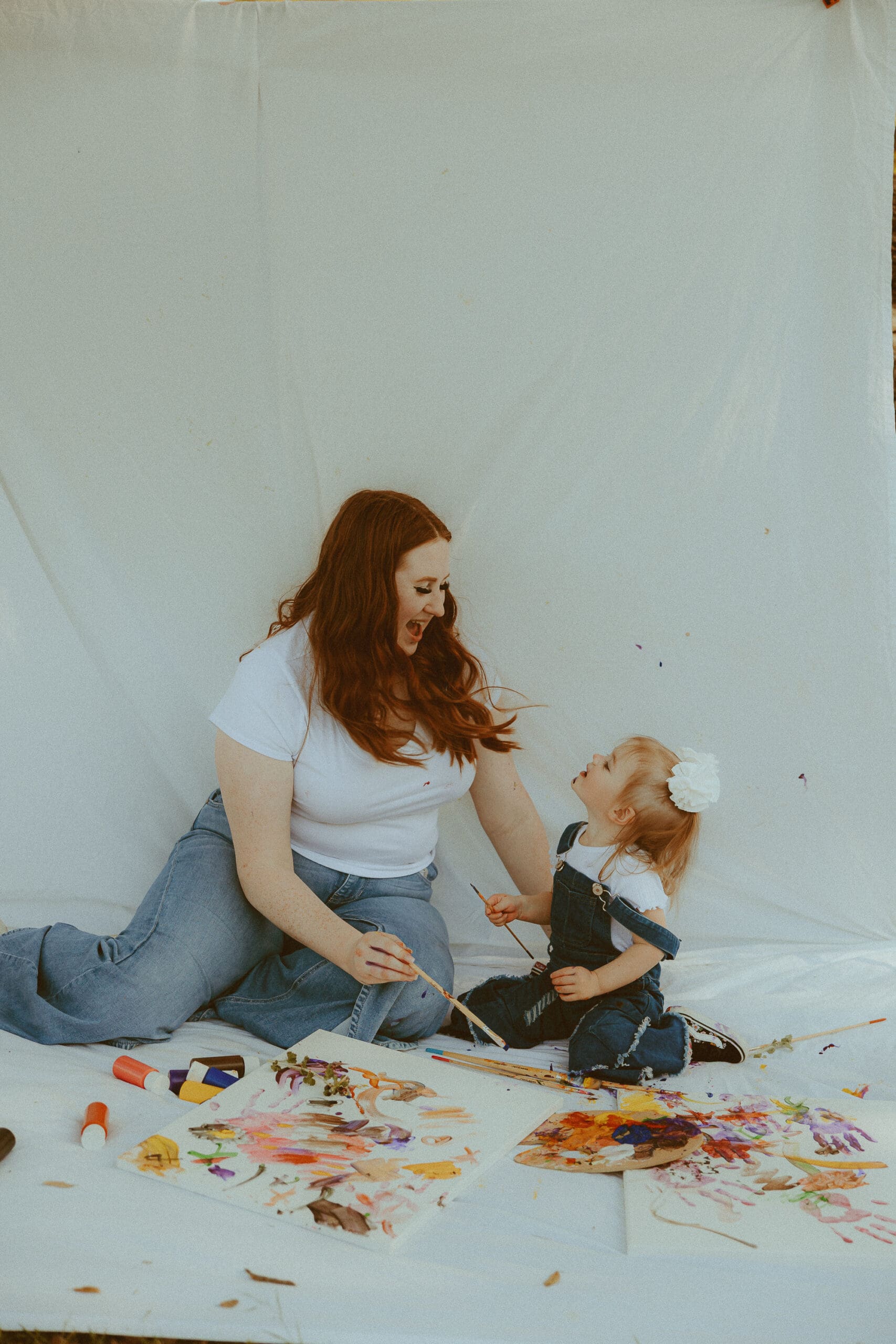 Mother daughter styled painting shoot in a field in Buffalo Gap, TX