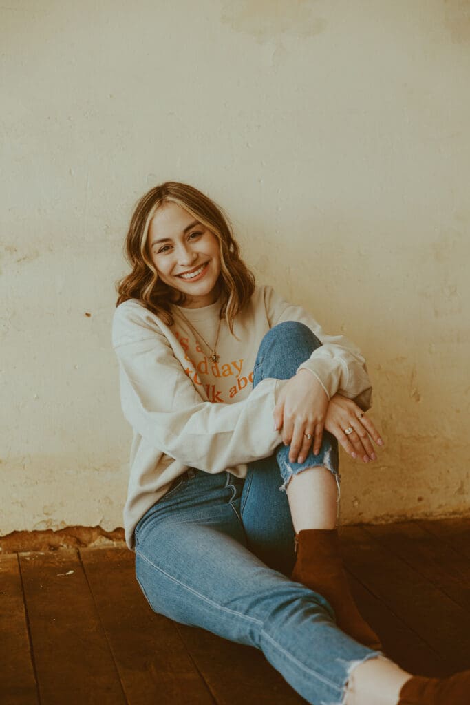 Fun senior session at the venue, The Lovely at Mulberry Creek, in downtown Merkel, TX