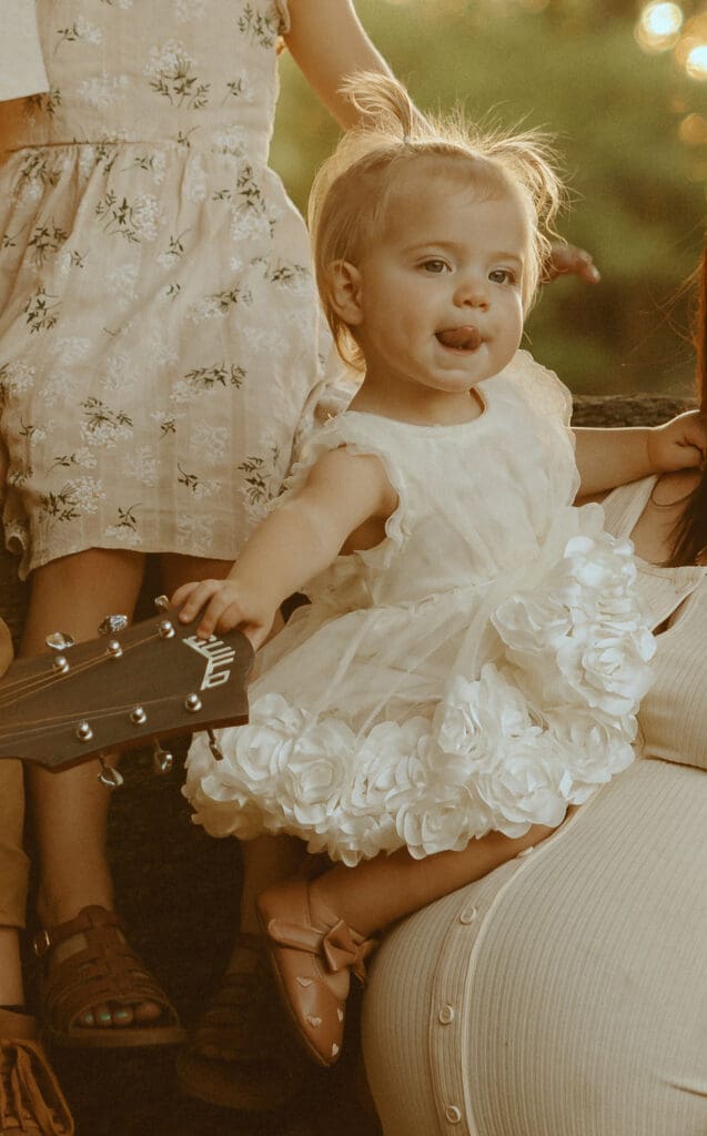 Intimate family session with guitar during golden hour in Buffalo Gap, TX