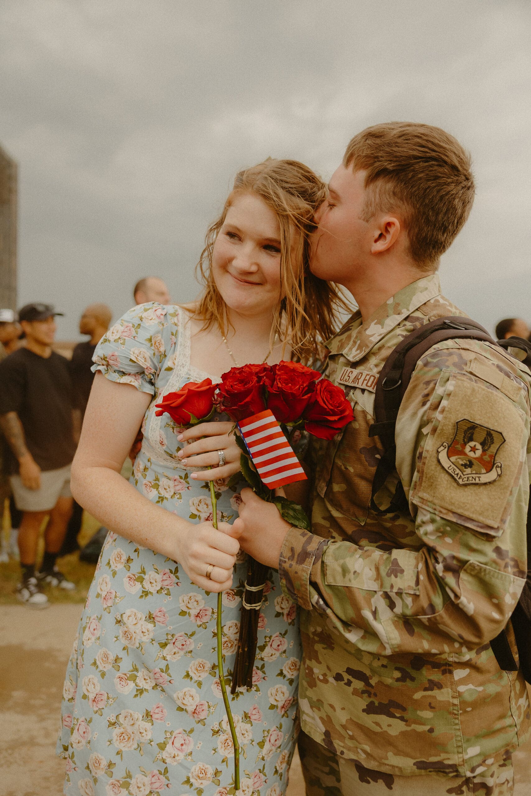 Intimate and joyful military homecoming reunion on the flight line at Dyess Air Force Base in Abilene, TX
