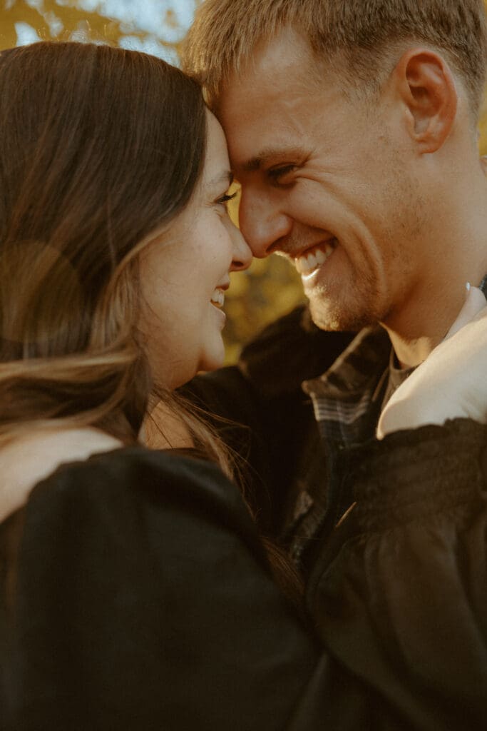 Romantic and intimate engagement session in a beautiful fall colored creekside in Abilene, TX