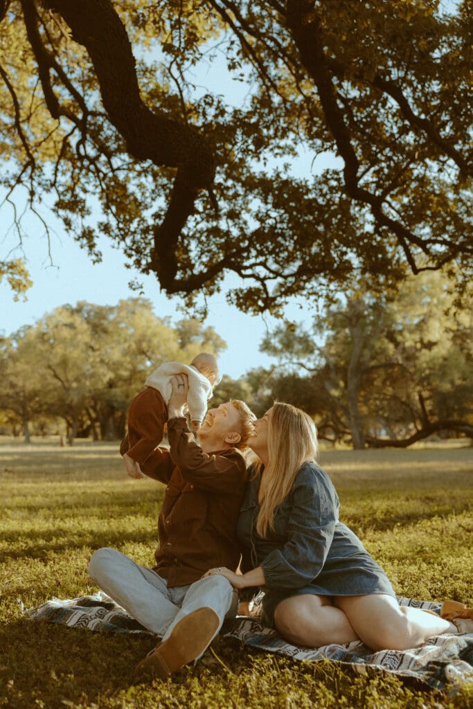 Intimate and cozy family session during golden hour in a field in Buffalo Gap, TX