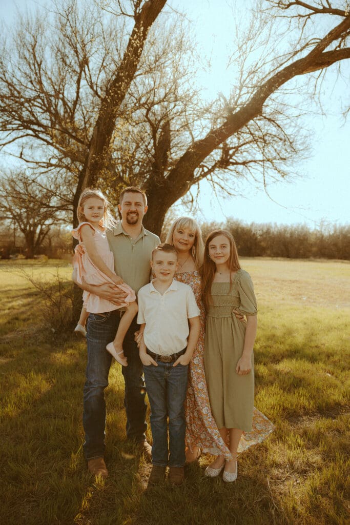 Intimate family session in a golden field in Abilene, TX