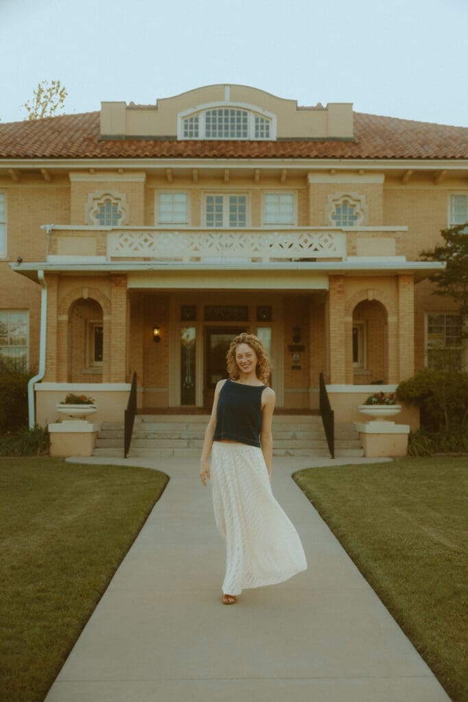 Whimsical and nostalgic senior session at an historic house in Abilene, TX