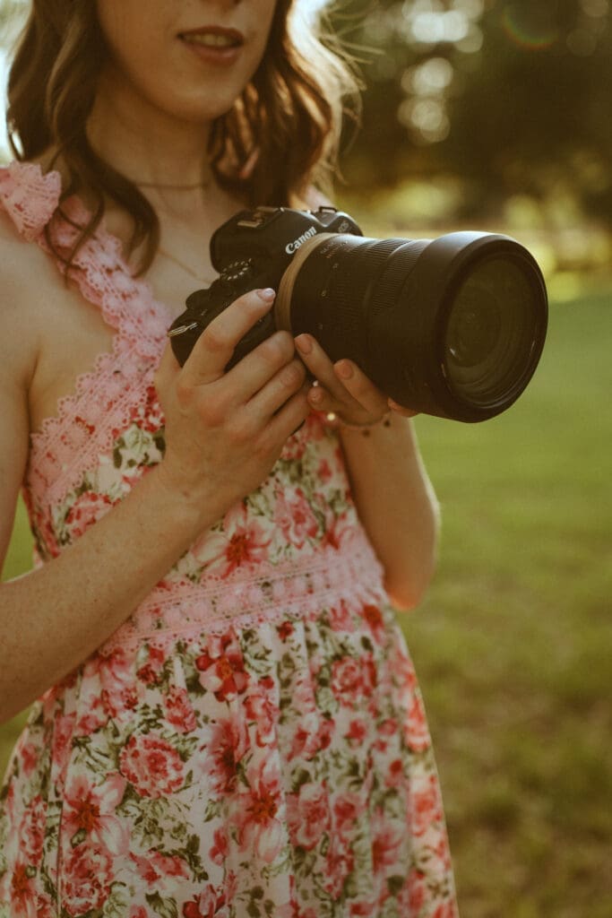 Close-up detail of a vintage-inspired camera held by Abilene photographer Morgan Rose, reflecting the thoughtful and nostalgic branding behind her photography business.